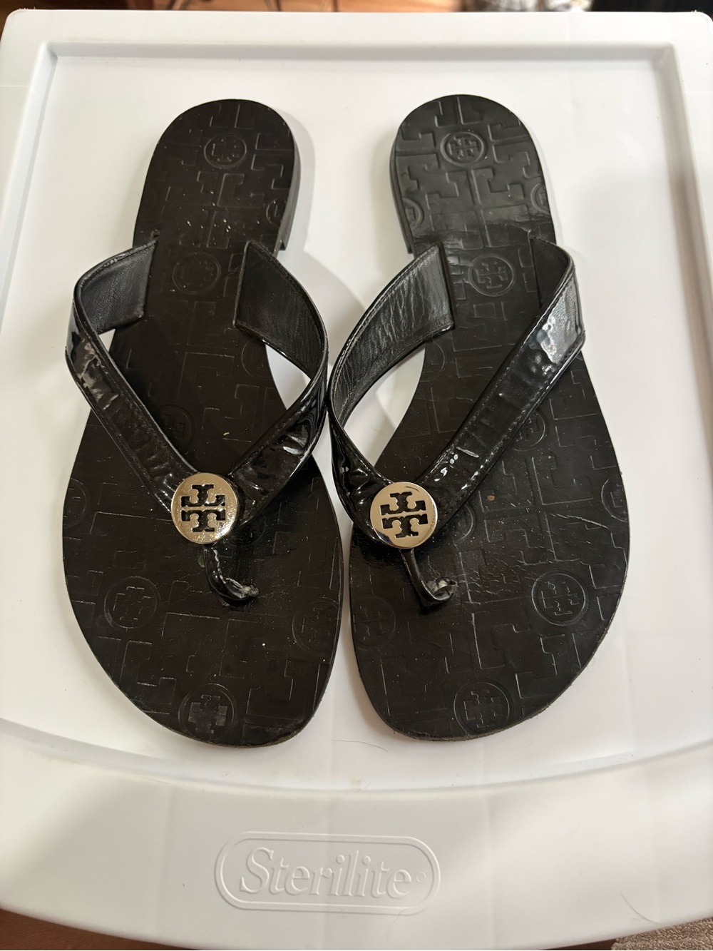 Tory Burch Black Patent Logo Thong Sandals with Gold Medallions